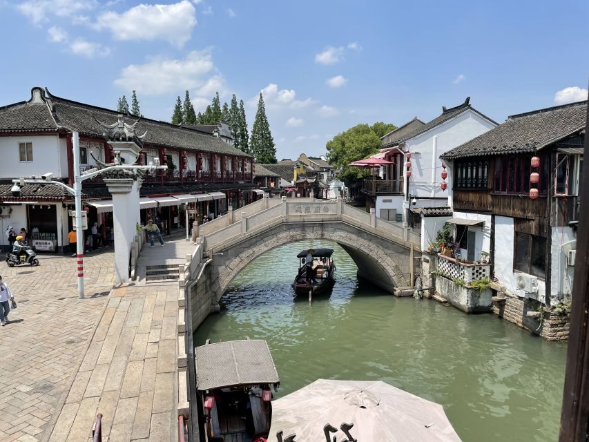 From Shanghai: Private Zhujiajiao Tour with Boat Ride - Garden Pause and Koi Feeding: A Quiet Detour From the Crowds