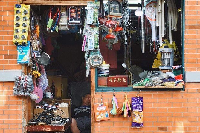 HuangPu River Ferry Boat & Highlights Bike Tour With Local Lunch - Sichuan North Road: Shopping Streets That Feel Like Real Life
