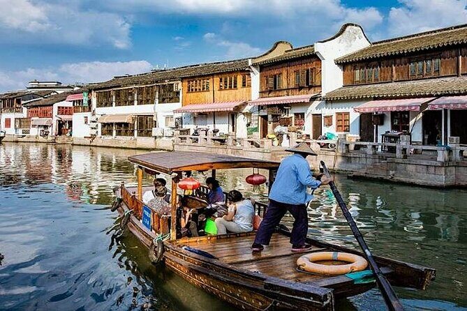 Private Half Day Tour: Zhujiajiao Water Town with Gondola Ride - Zhujiajiao Ancient Town: canals, stone bridges, and old-lane wandering