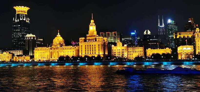 Shanghai Night River Cruise VIP Seat with Authentic Dinner - Your English guide: stories that make the skyline make sense