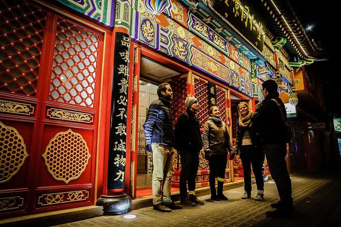 Shanghai Small-Group Night Tour by Bike - A traditional Chinese medicine outlet stop that adds context fast