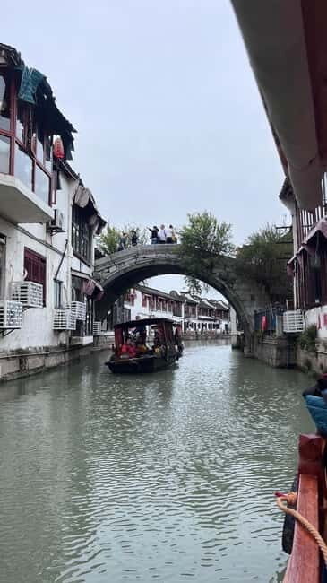 Shanghai: Zhujiajiao Water Town with Calligraphy Experience - Key highlights you’ll actually feel