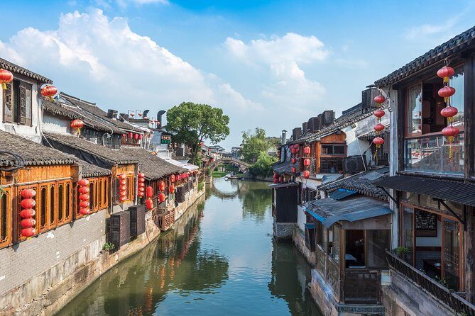 Wuzhen and Xitang Water Town Private Full Day Trip from Shanghai with Lunch and Dinner - Entering Wuzhen Water Town: 1,300 Years of Canals and Stone Arches