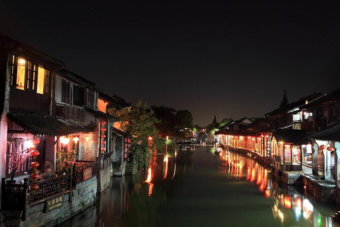 Xitang Water Village Sunset Tour with Riverside Dining Experience from Shanghai - Jinze Water Village boat ride: the calmer start